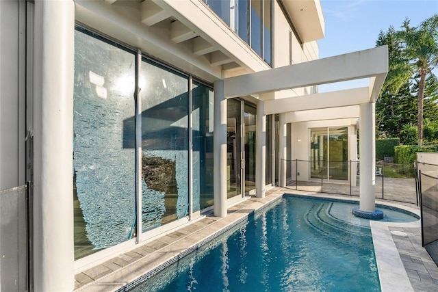 view of swimming pool featuring a patio