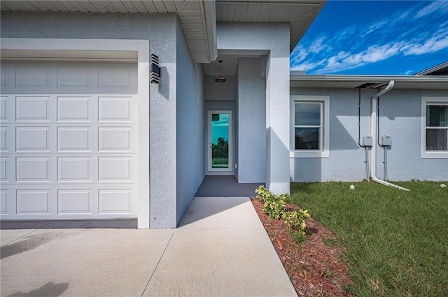 property entrance with a garage