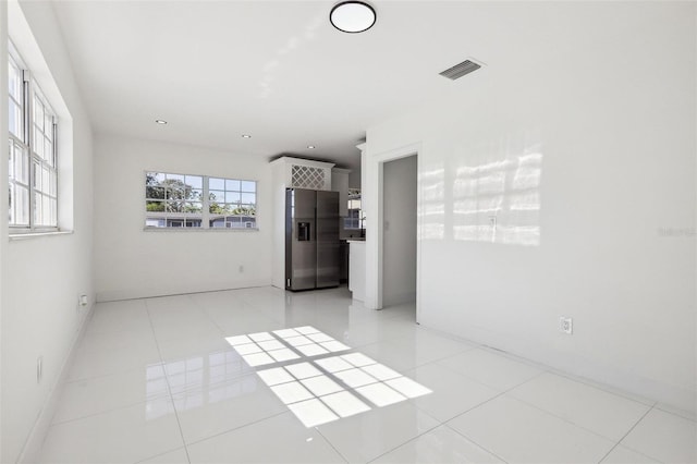 view of tiled spare room