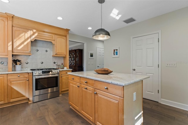 kitchen featuring dark hardwood / wood-style flooring, high end stove, light brown cabinets, decorative light fixtures, and a center island