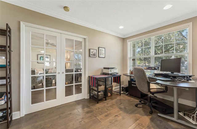 office area with french doors, dark wood-type flooring, a textured ceiling, and ornamental molding