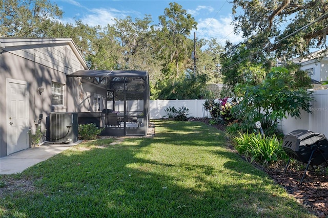 view of yard featuring central AC unit