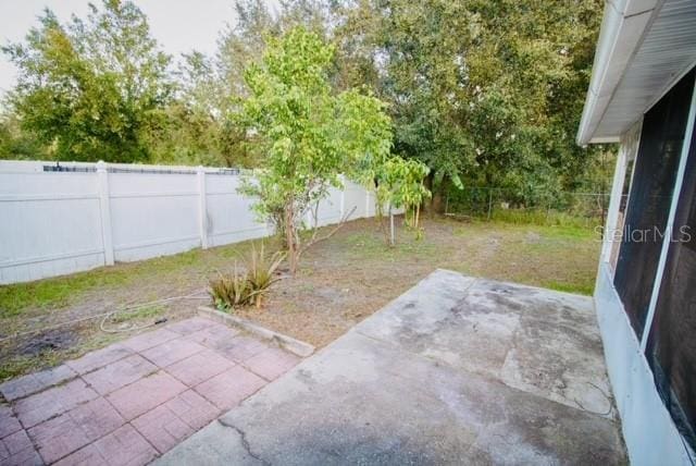 view of yard with a patio area