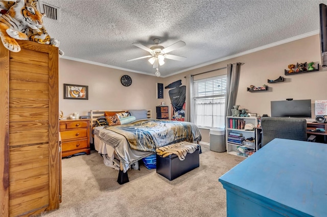 bedroom featuring carpet flooring, ceiling fan, crown molding, and a textured ceiling