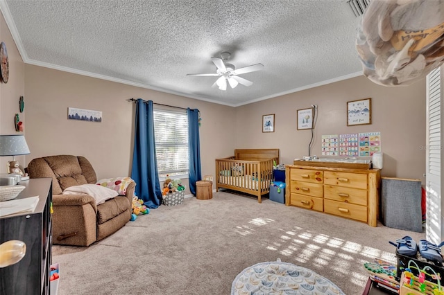 bedroom featuring a crib, light carpet, ceiling fan, and crown molding