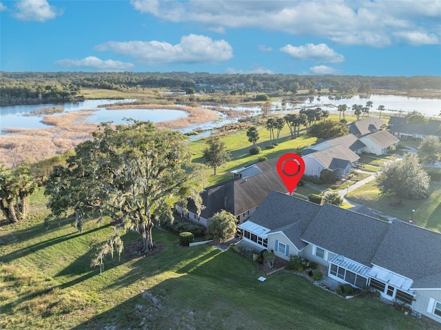 bird's eye view with a water view