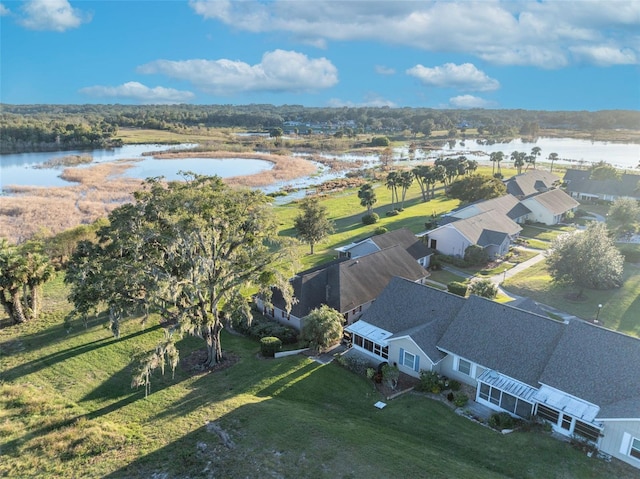 bird's eye view with a water view