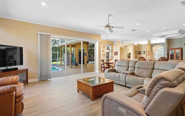 living room featuring light wood-type flooring and ceiling fan