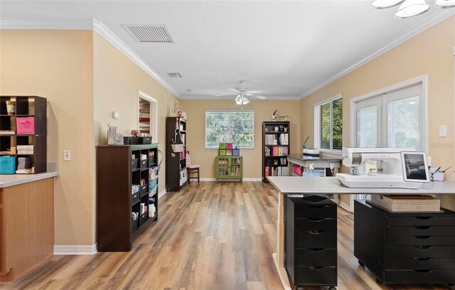 office space with ceiling fan, hardwood / wood-style floors, and ornamental molding