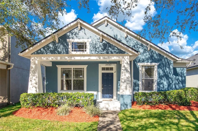 view of front of home featuring a front yard