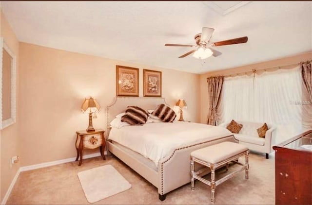 bedroom with light carpet and ceiling fan