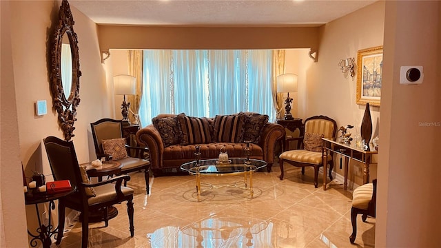 living room featuring a textured ceiling