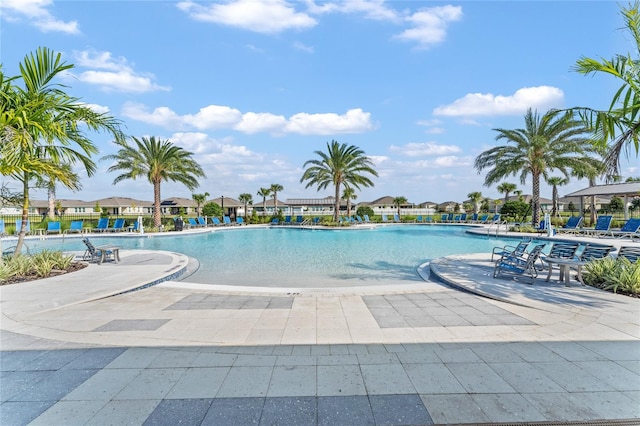 view of swimming pool with a patio area