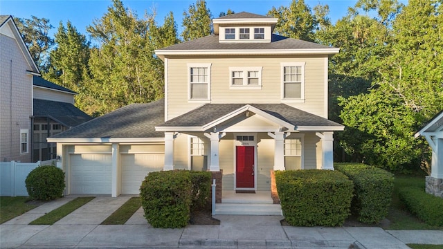 view of front of property featuring a garage