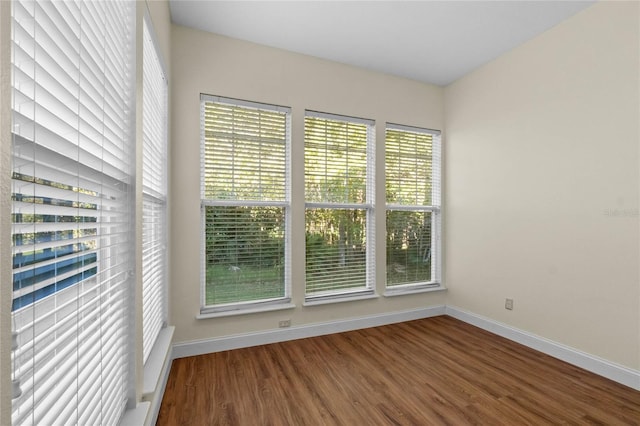 spare room featuring hardwood / wood-style flooring