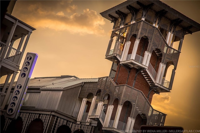 view of outdoor building at dusk