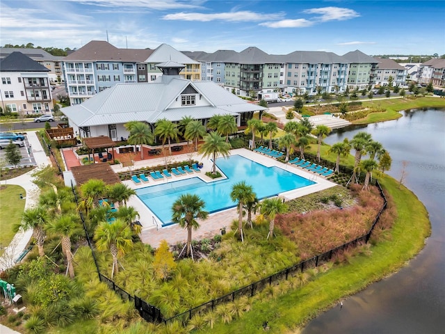 view of pool with a water view