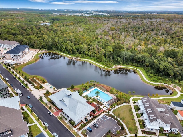 birds eye view of property featuring a water view