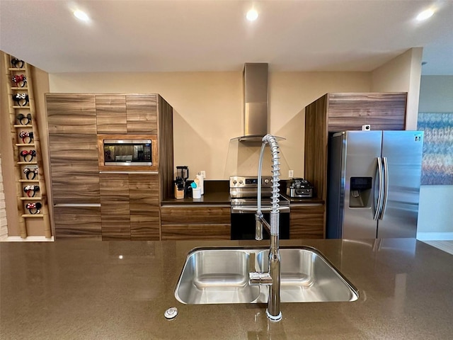 kitchen featuring exhaust hood and appliances with stainless steel finishes