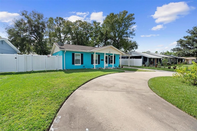 single story home with a front yard