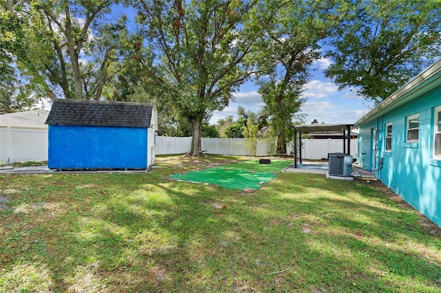 view of yard featuring central AC unit