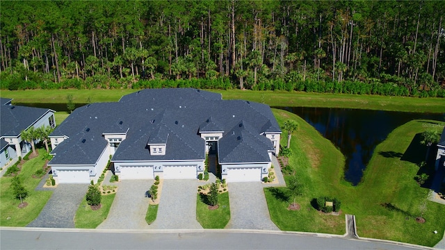 drone / aerial view with a water view