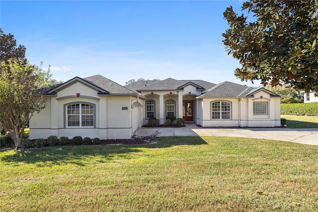 single story home featuring a front yard