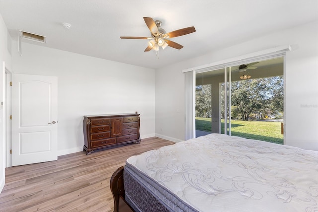 bedroom featuring ceiling fan, light wood-type flooring, and access to outside