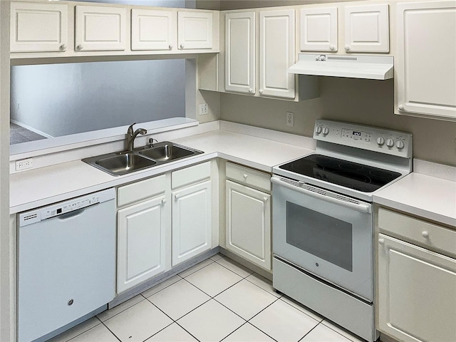 kitchen featuring white cabinetry, sink, white dishwasher, stainless steel electric range, and light tile patterned floors