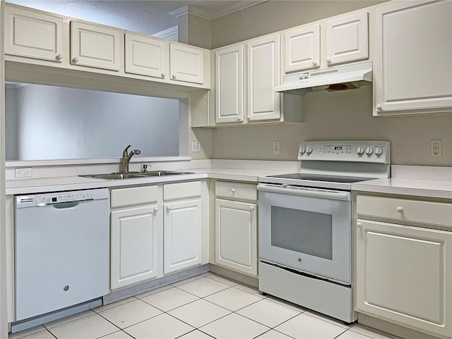 kitchen featuring light tile patterned floors, white appliances, white cabinetry, and sink