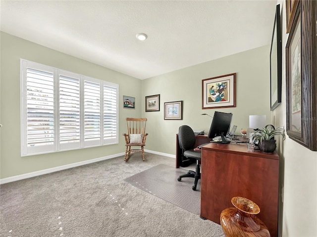 office space with light colored carpet