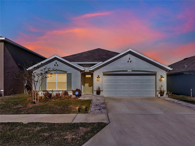 single story home featuring a garage