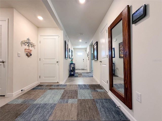 7729 Rosewood Garden Loop, Tampa, FL 33637 - corridor featuring recessed lighting and tile patterned floors