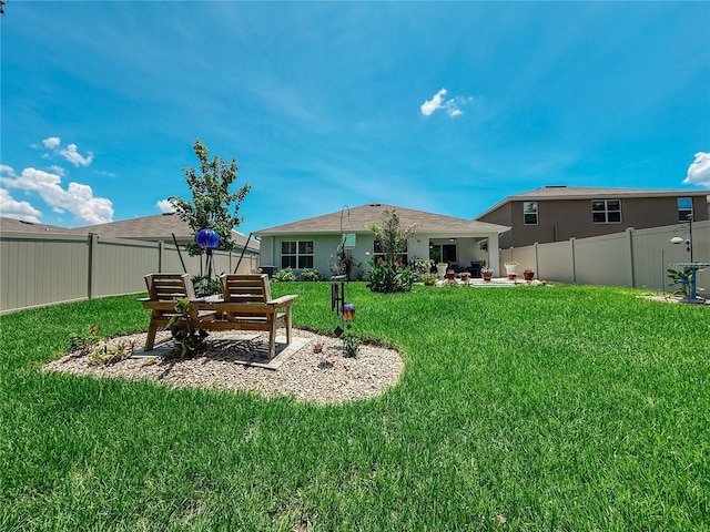 7729 Rosewood Garden Loop, Tampa, FL 33637 - fenced backyard with a patio
