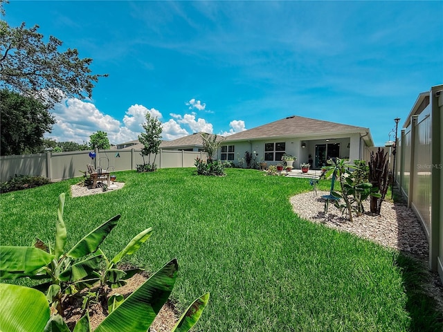 7729 Rosewood Garden Loop, Tampa, FL 33637 - view of fenced backyard