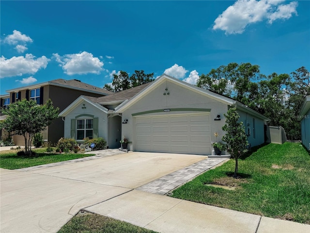 7729 Rosewood Garden Loop, Tampa, FL 33637 - ranch-style house featuring stucco siding, a garage, concrete driveway, and a front lawn