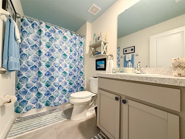 7729 Rosewood Garden Loop, Tampa, FL 33637 - bathroom with vanity, tile patterned floors, and a shower with shower curtain