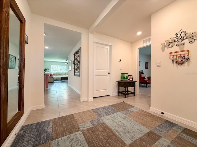 7729 Rosewood Garden Loop, Tampa, FL 33637 - hall with light tile patterned floors and recessed lighting
