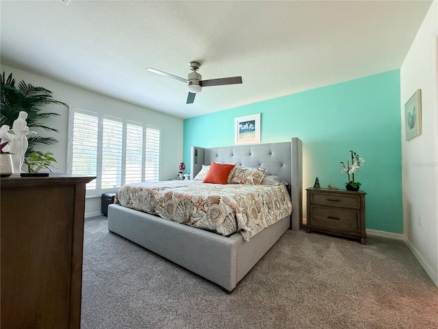 7729 Rosewood Garden Loop, Tampa, FL 33637 - carpeted bedroom with baseboards and a ceiling fan