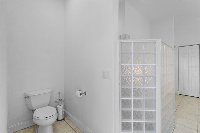 bathroom featuring tile patterned floors and toilet