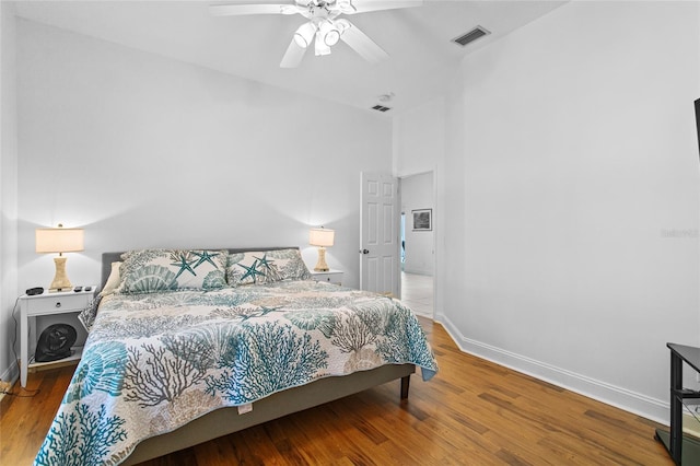 bedroom featuring ceiling fan and wood-type flooring