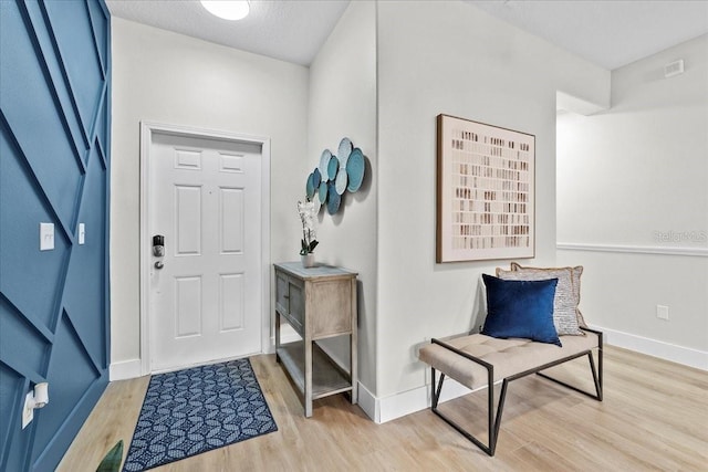 foyer featuring light hardwood / wood-style flooring