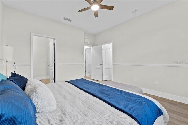 bedroom featuring ceiling fan and hardwood / wood-style floors