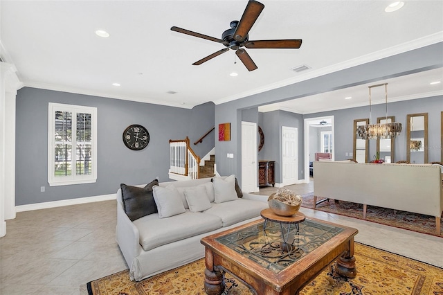 tiled living room with crown molding and ceiling fan with notable chandelier