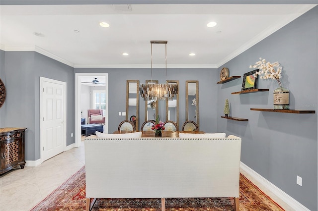 tiled dining area featuring ceiling fan with notable chandelier and crown molding