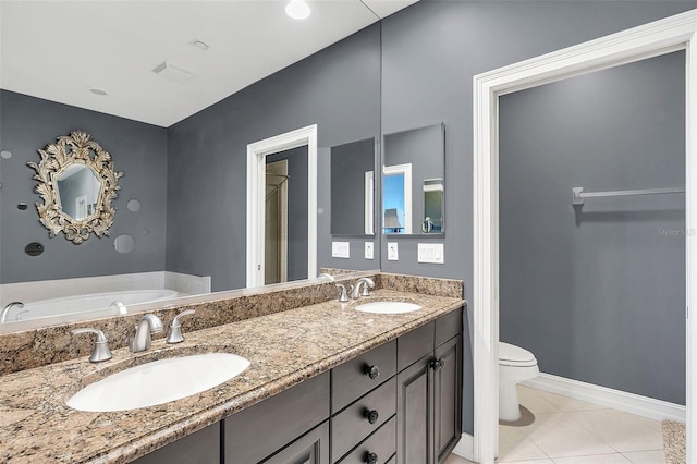 bathroom with toilet, a tub, tile patterned floors, and vanity