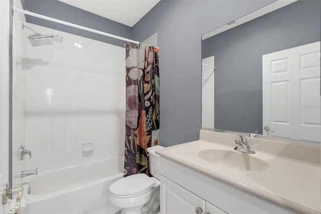 full bathroom with shower / bathtub combination with curtain, vanity, and toilet