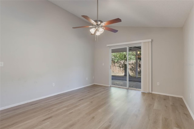 empty room with ceiling fan, light hardwood / wood-style floors, and lofted ceiling