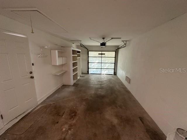 4518 Watch Hill Rd, Orlando, FL 32808 - garage featuring a garage door opener