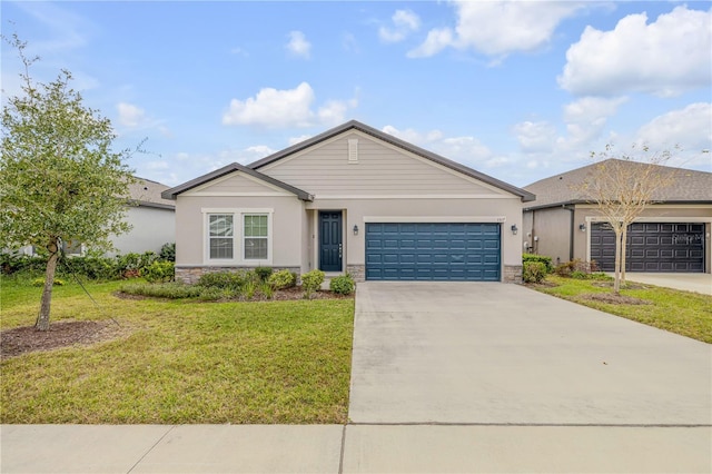 ranch-style home with a front yard and a garage